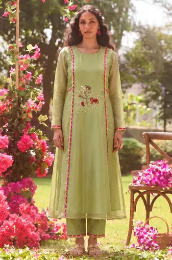 Elegant pista green tissue kurta pant set featuring palm motifs with delicate sequin and bead work, finished.
