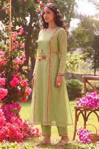 Elegant pista green tissue kurta pant set featuring palm motifs with delicate sequin and bead work, finished.