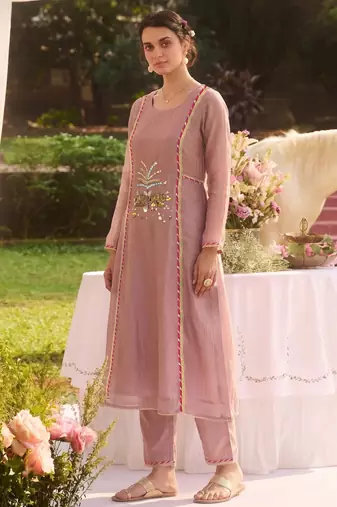 Elegant dusty pink tissue kurta pant set featuring intricate palm motifs with sequin and bead work, enhanced.