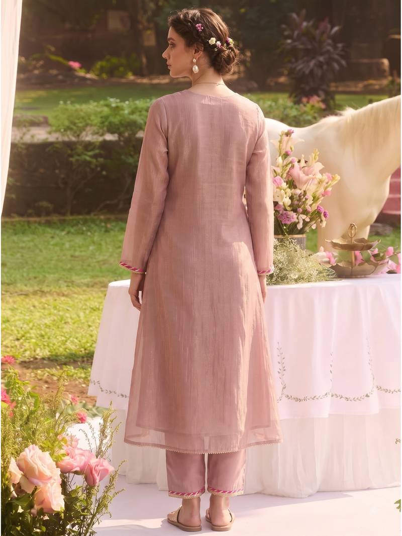 Elegant dusty pink tissue kurta pant set featuring intricate palm motifs with sequin and bead work, enhanced.
