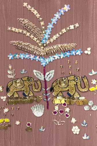 Elegant dusty pink tissue kurta pant set featuring intricate palm motifs with sequin and bead work, enhanced.