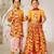 Mustard & red sequinned & solid muslin lehenga choli & dhoti kurta brother sister matching combo