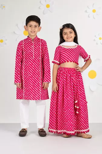 Pink leheriya & printed cotton lehenga choli & kurta pyjama brother sister matching combo