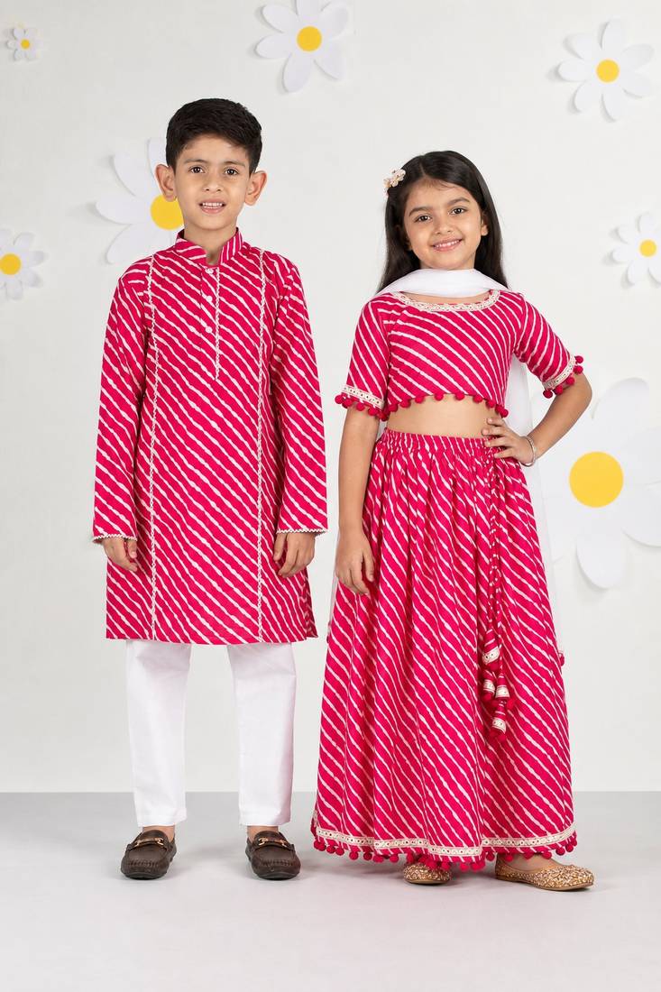 Pink leheriya & printed cotton lehenga choli & kurta pyjama brother sister matching combo
