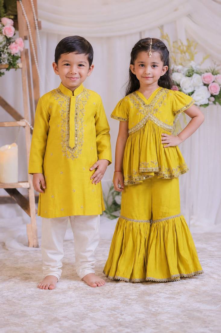 Mustard yellow & yellow embroidered silk sharara set & kurta pyjama brother sister matching combo