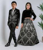 Black embroidered velvet lehenga choli & tuxedo brother sister matching combo