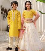 Yellow & mustard yellow mirror work net lehenga choli & kurta pyjama brother sister matching combo