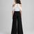 White & black solid japanese crepe & cotton jumpsuit & shirt brother sister matching combo