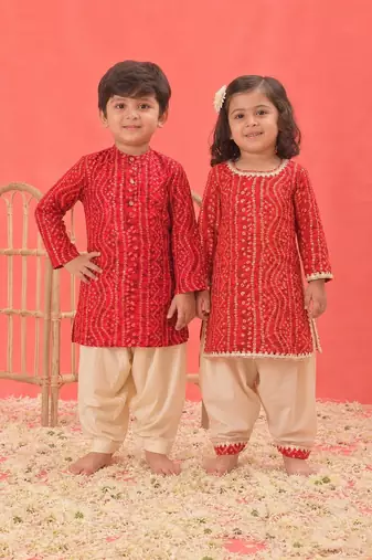 Red printed rayon kurta patiala set & kurta pyjama brother sister matching combo
