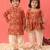 Red printed rayon dhoti kurta set & kurta pyjama brother sister matching combo