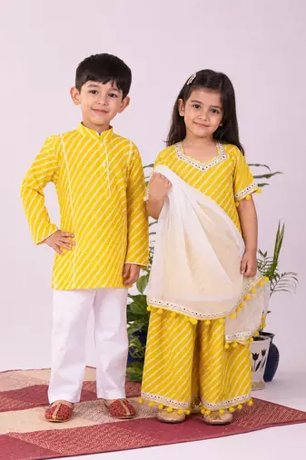 Yellow & white leheriya & printed cotton lehenga choli & kurta pyjama brother sister matching combo