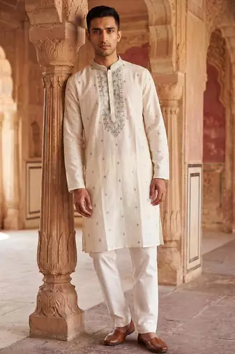 white embroidered work roman silk kurta with cotton cream pajama 