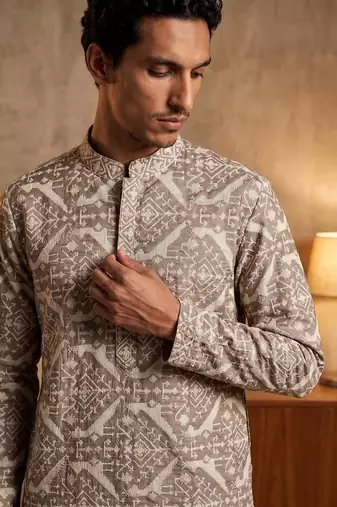 dark green embroidered work silk kurta with cotton cream pajama 