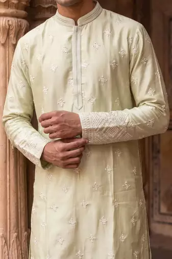 pista green embroidered & mirror work silk kurta with cotton cream pajama 
