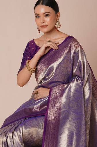 Woven design saree with blouse piece
