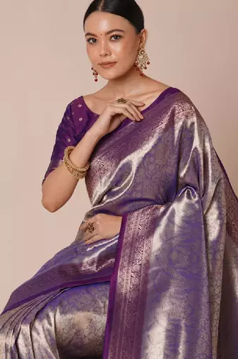 Woven design saree with blouse piece