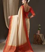 Off white & red woven design zari pure georgette kanjeevaram saree