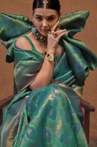 Woven design zari silk blend kanjeevaram saree with matching blouse