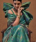 Woven design zari silk blend kanjeevaram saree with matching blouse
