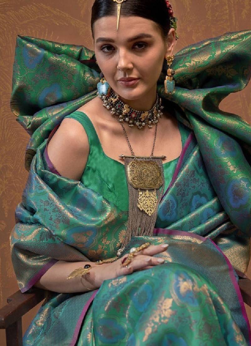 Woven design zari silk blend kanjeevaram saree with matching blouse