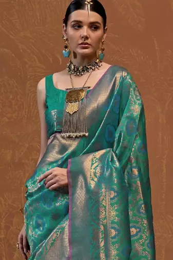 Woven design zari silk blend kanjeevaram saree with matching blouse