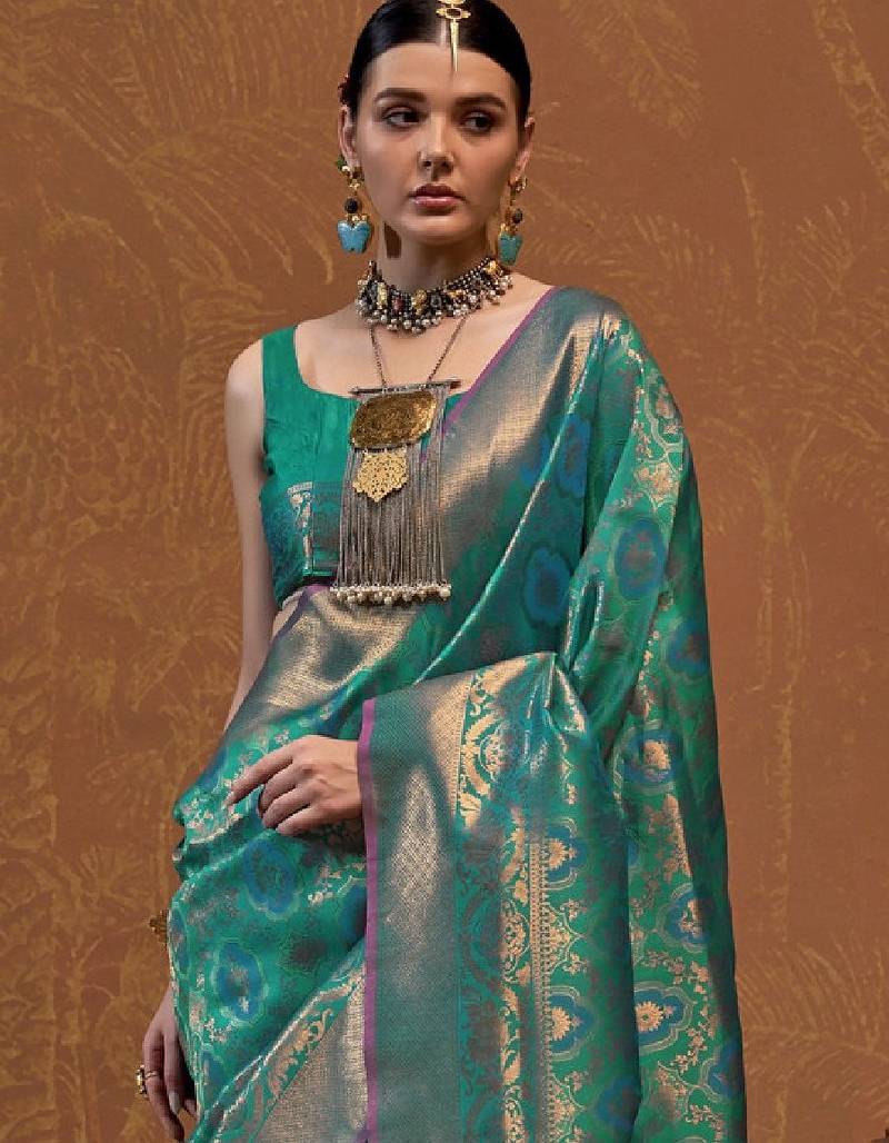Woven design zari silk blend kanjeevaram saree with matching blouse