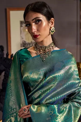 Teal & gold-toned woven design zari silk blend kanjeevaram saree
