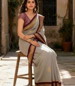 Ethnic motifs embroidered art silk kanjeevaram saree