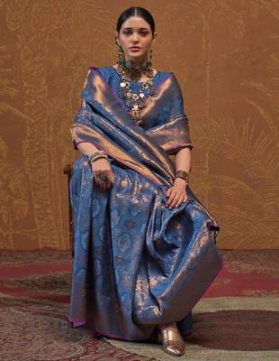 Woven design zari silk blend kanjeevaram saree with matching blouse 1