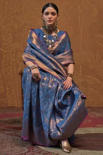 Woven design zari silk blend kanjeevaram saree with matching blouse