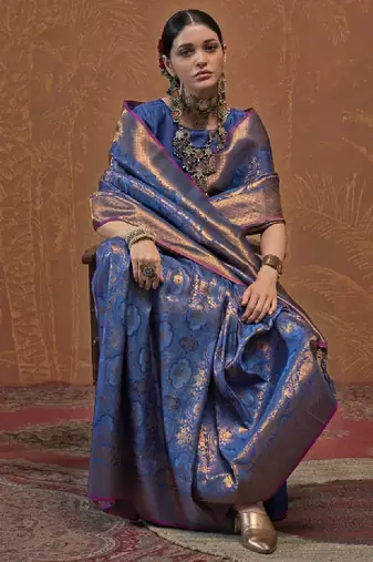 Woven design zari silk blend kanjeevaram saree with matching blouse