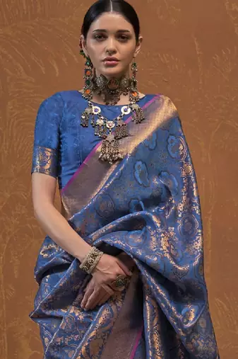 Woven design zari silk blend kanjeevaram saree with matching blouse