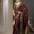 Burgundy & green ethnic motifs woven design zari pure georgette kanjeevaram saree