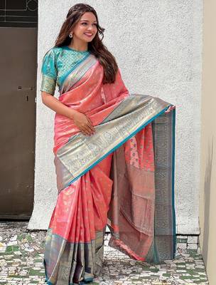 Peach floral woven design zari kanjeevaram silk saree 1