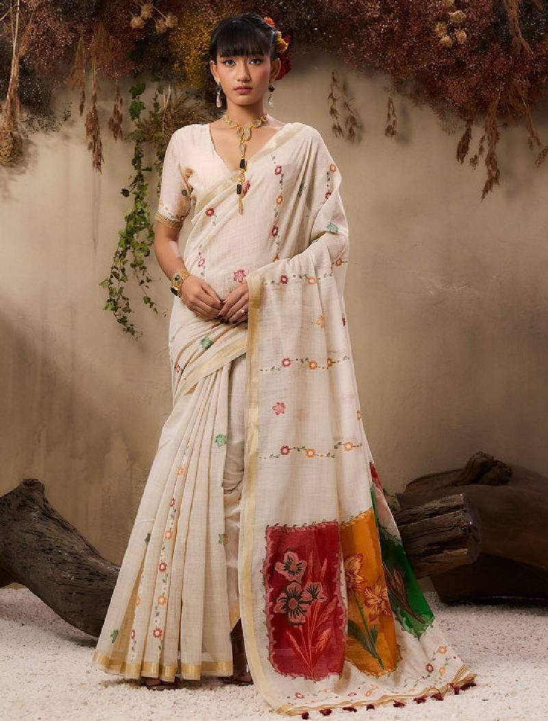 Floral embroidered muga cotton saree with unstitched blouse