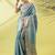 Turquoise blue embellished sarees