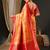 Peach-coloured & red ethnic motifs woven design zari kanjeevaram saree