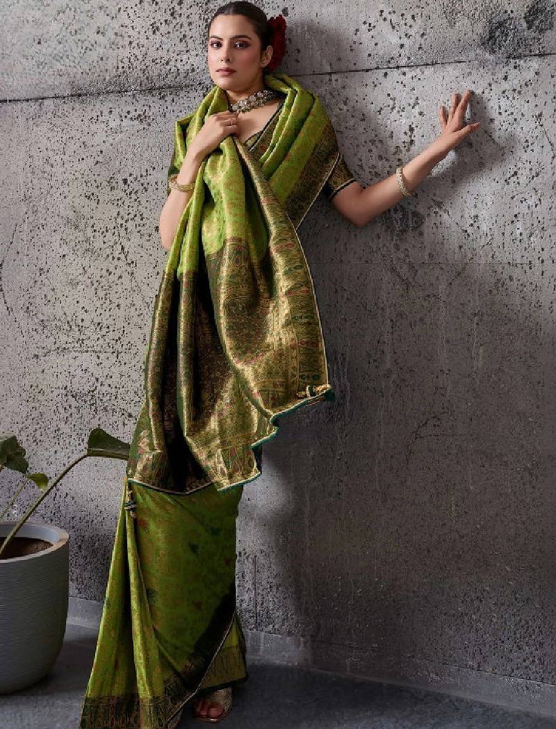 Green premium kanjivaram silk meenakari woven saree with tassel pallu