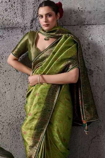 Green premium kanjivaram silk meenakari woven saree with tassel pallu