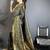 Dark green banarasi soft silk checked body floral motifs south pattu sarees