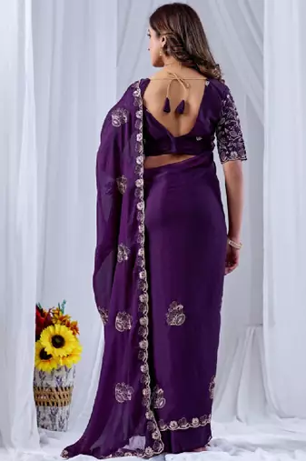 Ethnic motifs embroidered sequinned pure georgette ikat saree