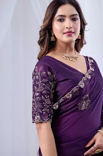 Ethnic motifs embroidered sequinned pure georgette ikat saree