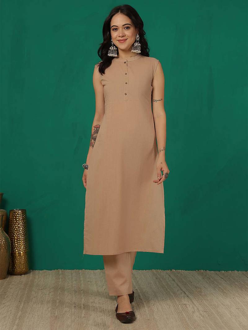 Beige solid pure cotton kurta set for women