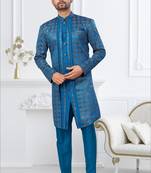 Royal blue jacket-style indo-western set with thread and stone work, perfect for weddings and festive occasions.