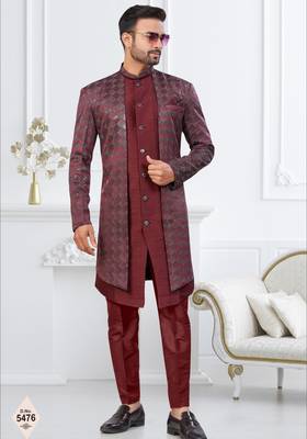 Dark maroon jacket-style indo-western set with thread and stone work, perfect for weddings and festive occasions. 1