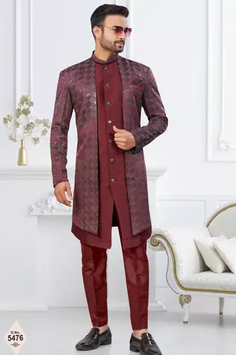 Dark maroon jacket-style indo-western set with thread and stone work, perfect for weddings and festive occasions.