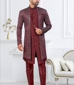 Dark maroon jacket-style indo-western set with thread and stone work, perfect for weddings and festive occasions.