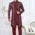 Dark maroon jacket-style indo-western set with thread and stone work, perfect for weddings and festive occasions.