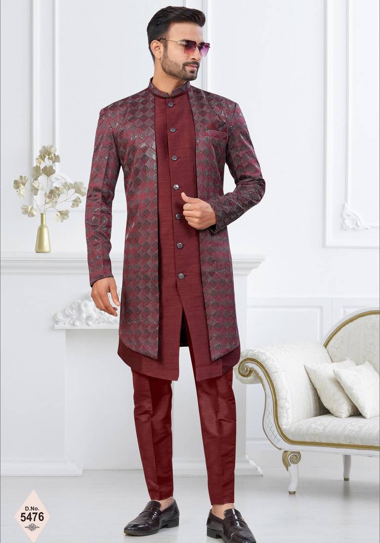 Dark maroon jacket-style indo-western set with thread and stone work, perfect for weddings and festive occasions.