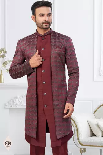Dark maroon jacket-style indo-western set with thread and stone work, perfect for weddings and festive occasions.